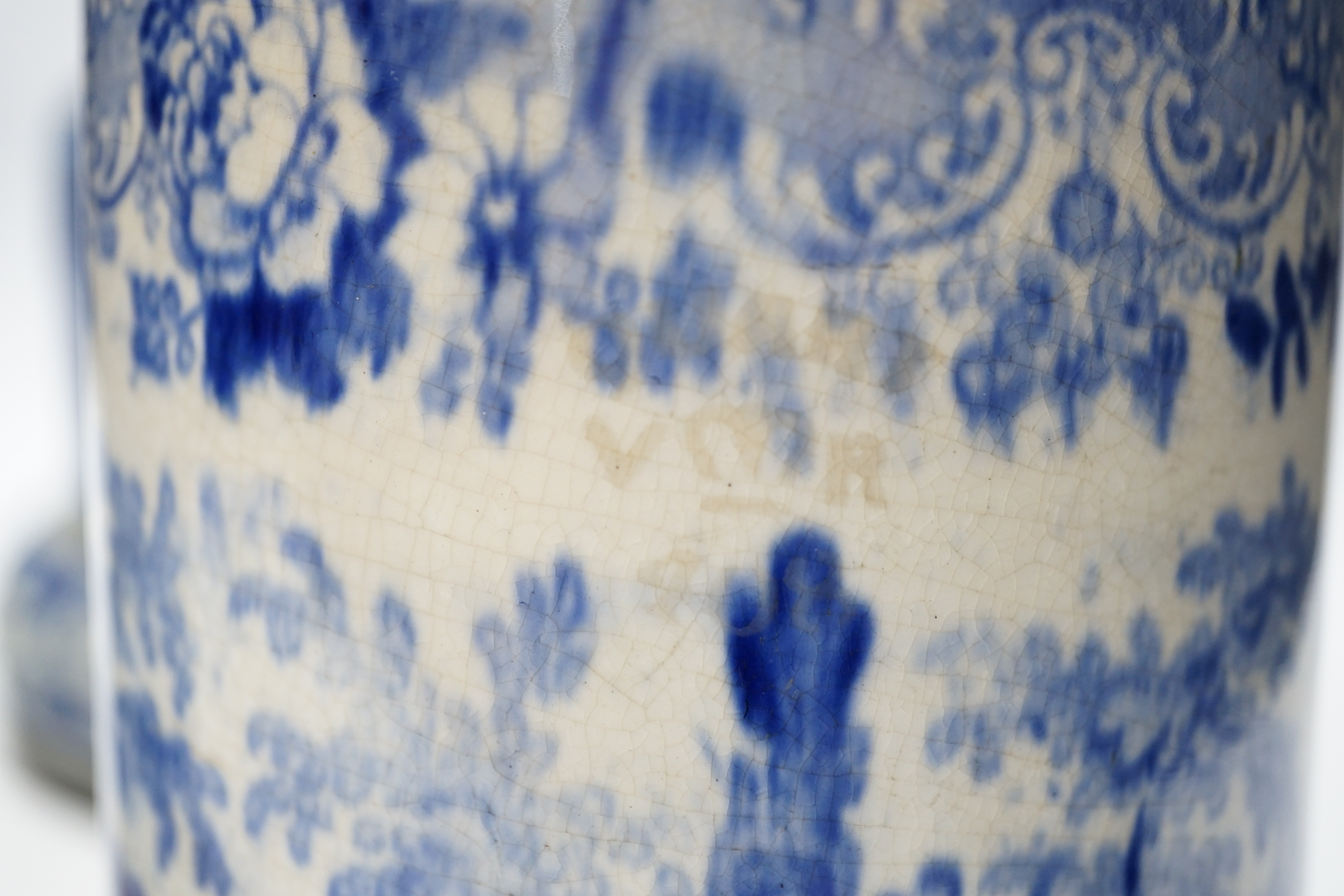 A Victorian Jasper ware cheese dome, a Wedgwood biscuit barrel and a transfer printed blue and white mug, largest 23cm in diameter